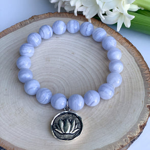 Blue Lace Agate. The Jewel Mama. Buy. Shop. Crystals. Bracelets. Yoga Collection.