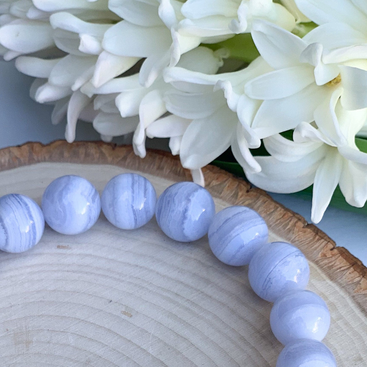 Blue Lace Agate. The Jewel Mama. Buy. Shop. Crystals. Bracelets. Yoga Collection.